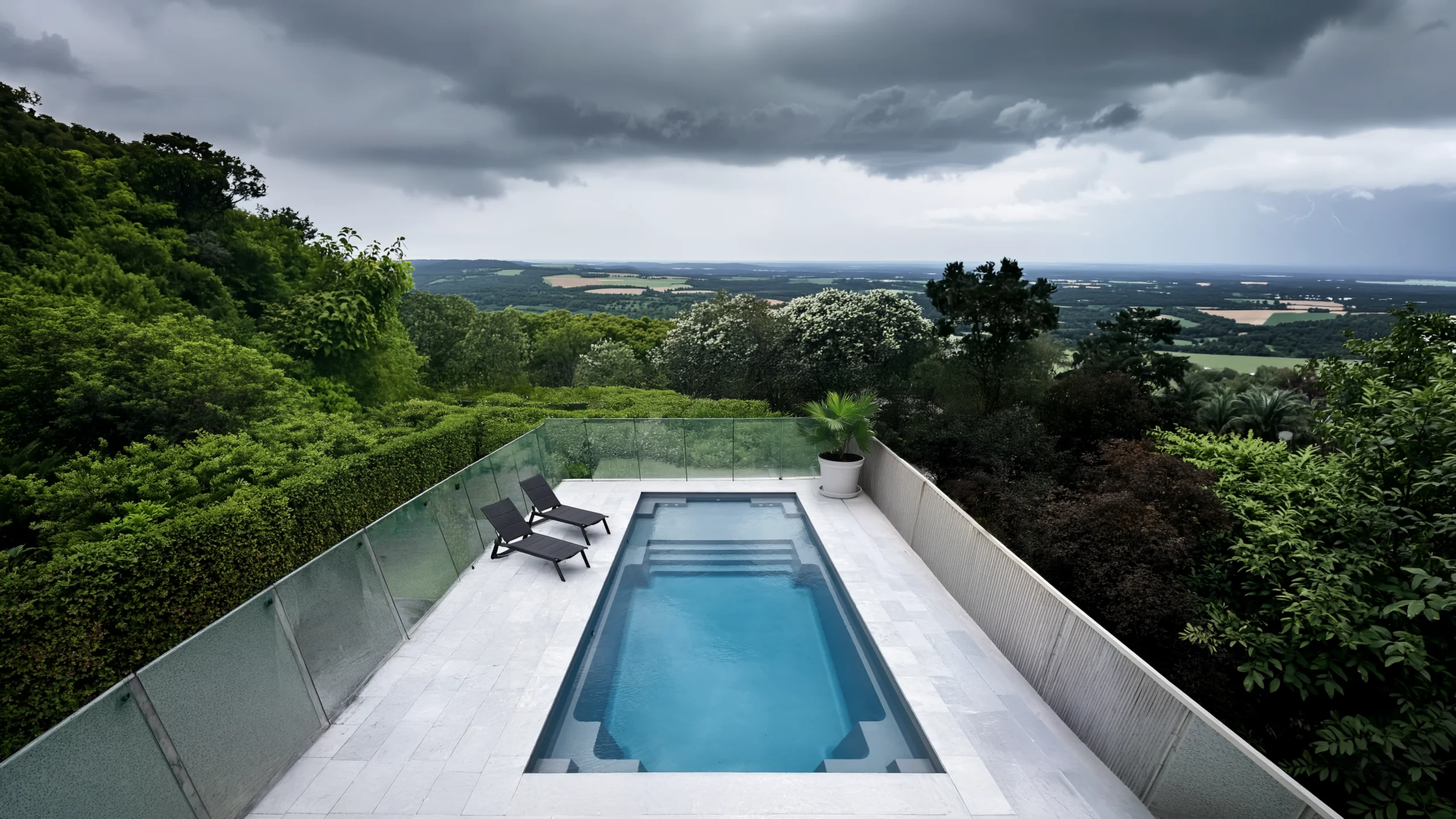 Pool overlooking a stormy landscape. The homeowners prepare a pool for a storm or cyclone perfectly.