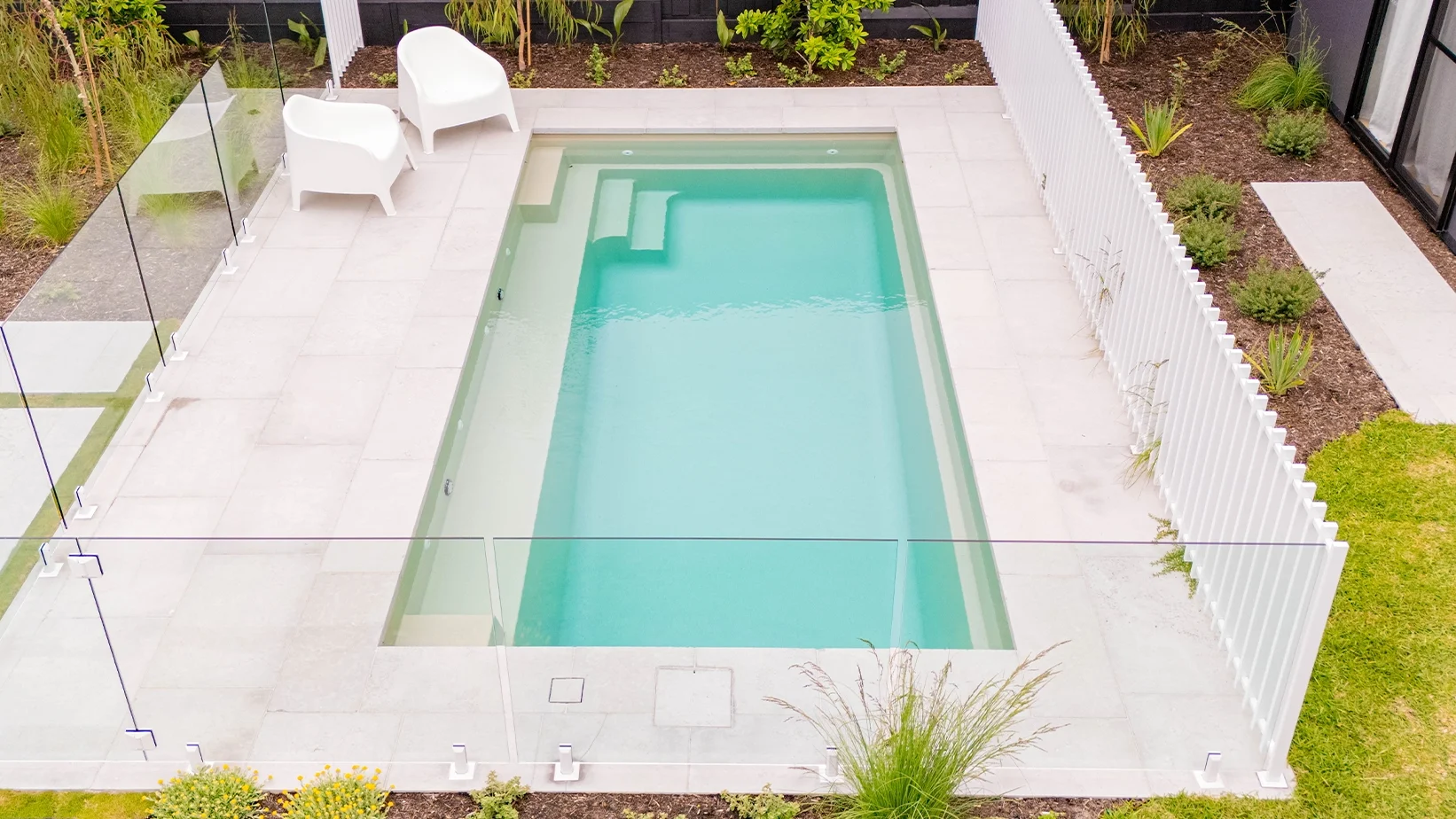 The Escape 6m - fibreglass swimming pool in beach colour