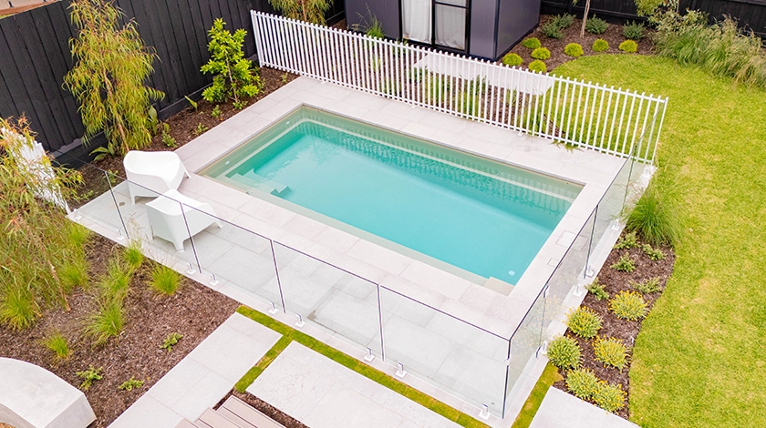 The Escape 6m - fibreglass swimming pool in beach colour