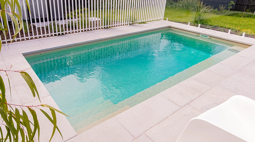 The Escape 6m - fibreglass swimming pool in beach colour