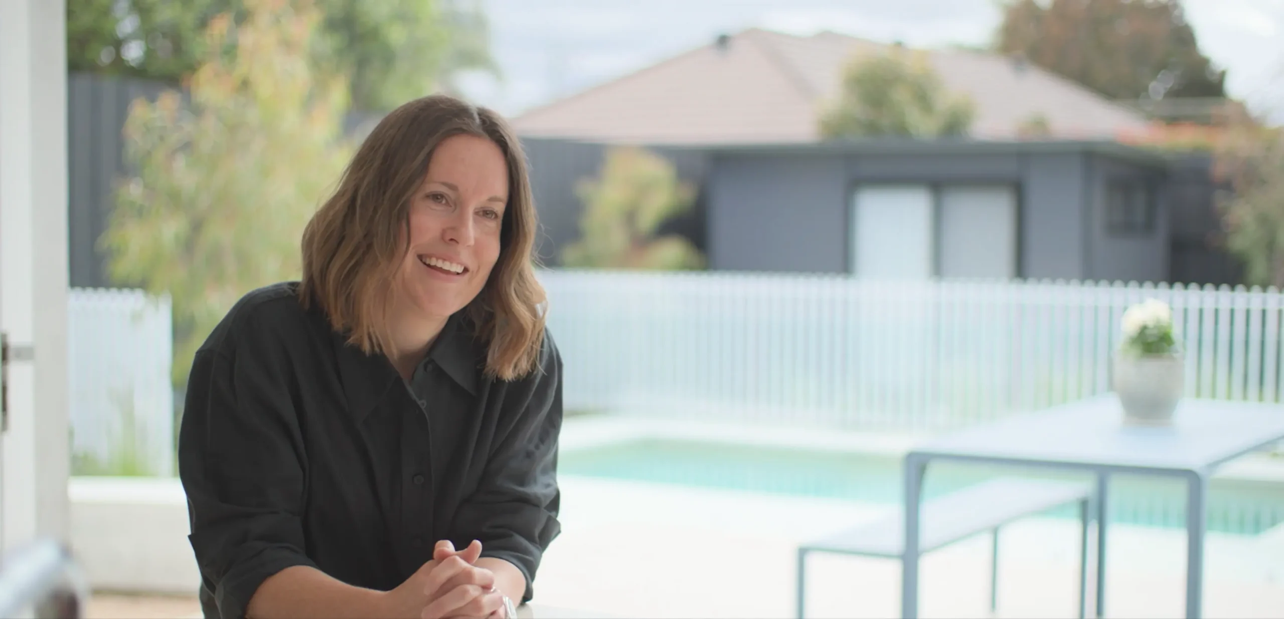 Megan with her swimming pool, reflecting on the quick and seamless installation experience she describes in her testimonial. Picture: Nexus Pools Melbourne Bayside.